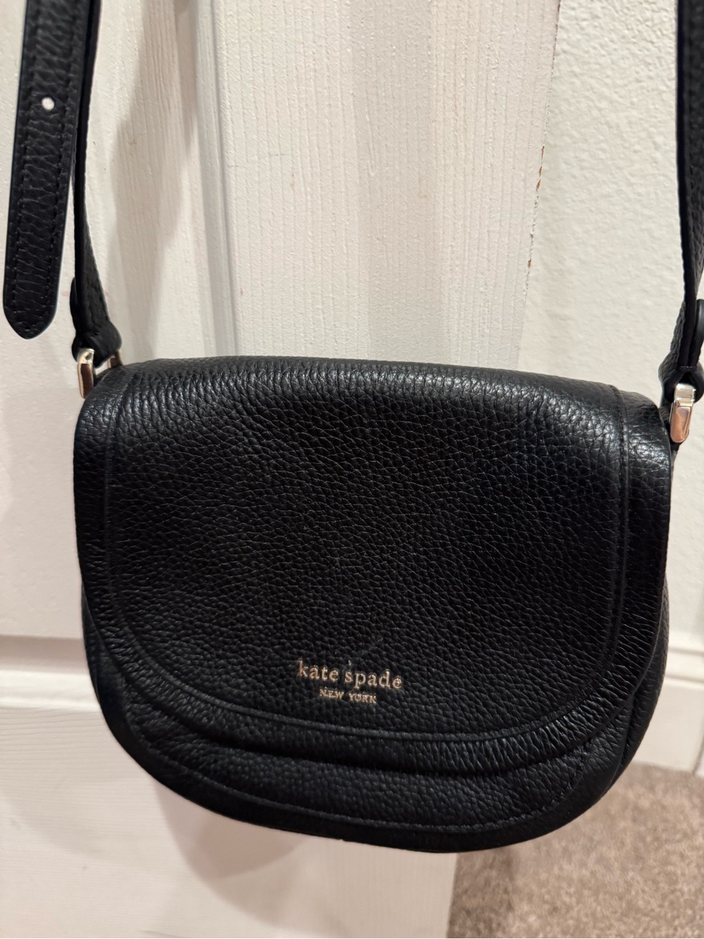 kate spade Black Pebbled Leather Saddle Crossbody with Gold Logo and hardware